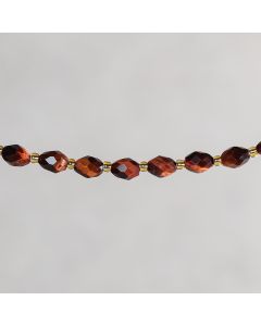 Oeil de tigre rouge d'Afrique olive facettée 6x8mm
